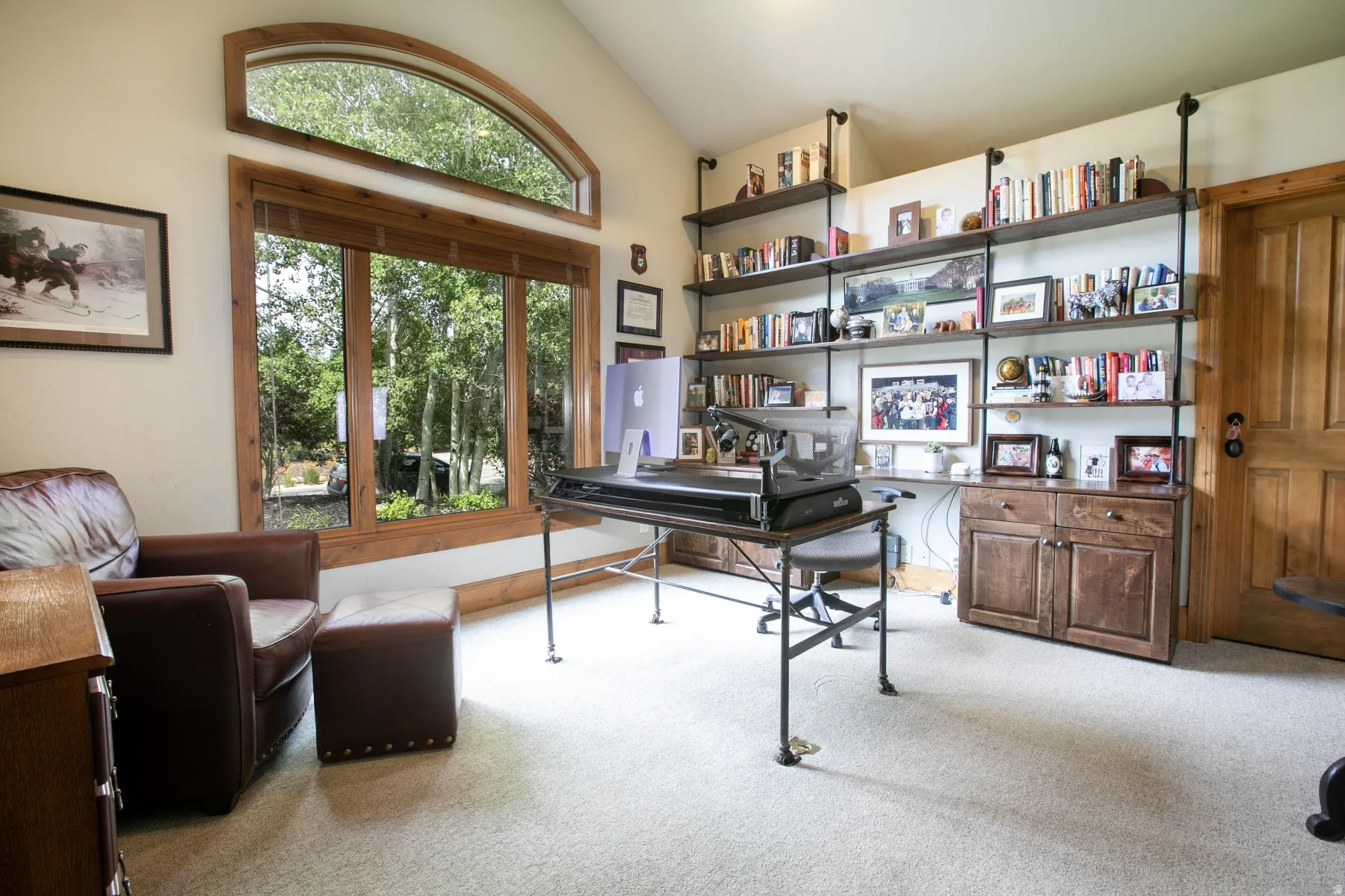 Vaulted ceiling with an arched transom window