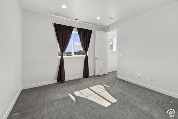 Bedroom 3 south facing with Recessed lighting, and paneled door
