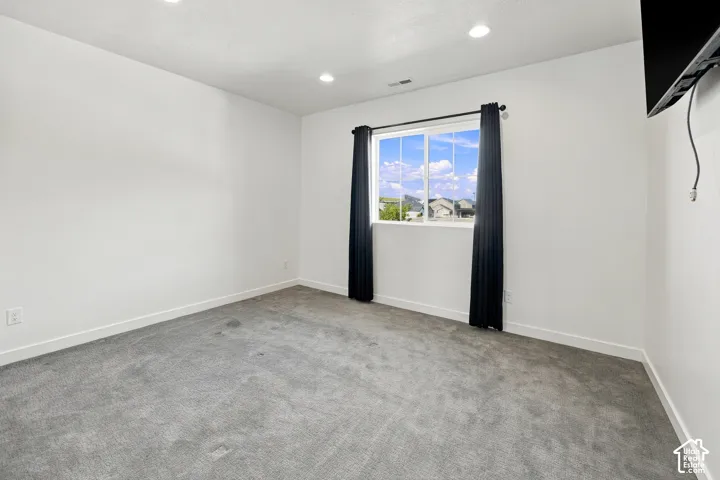 2nd bedroom with north facing windows with territorial views