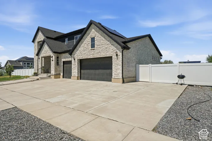 Striking stone exterior with multi-gabled roofline and architectural detail