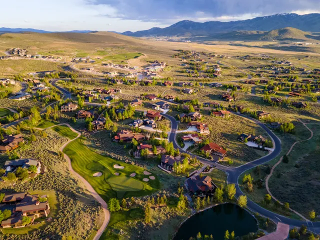 Expansive residential development featuring curving roads and varied architectural styles