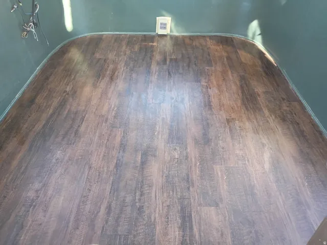Wood-finish flooring with varied warm tones