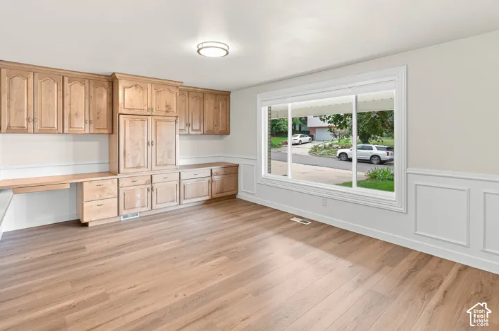 Family room off kitchen & front entry