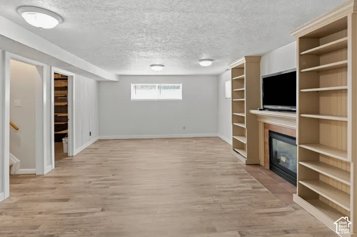 Family down with gas log fireplace