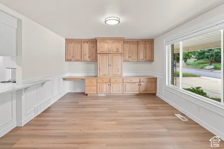 Family room off kitchen with picturesque front window