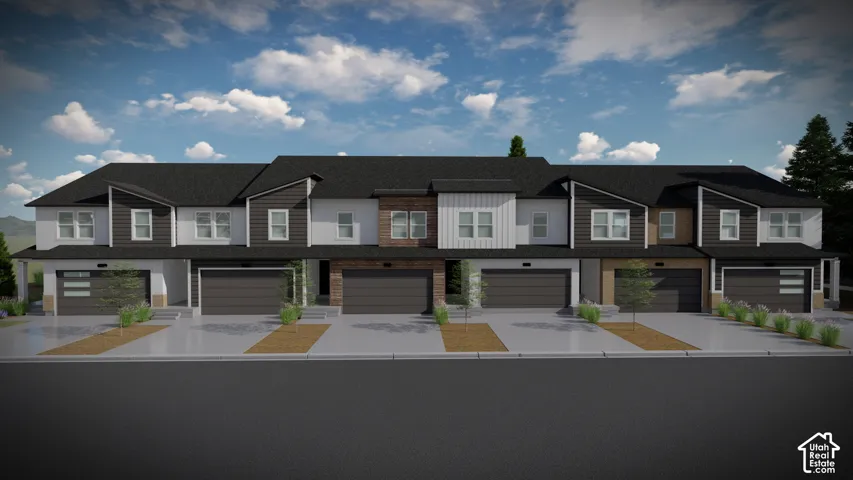 Contemporary townhome exteriors featuring varied siding textures, private garage entrances, and individual paved driveways