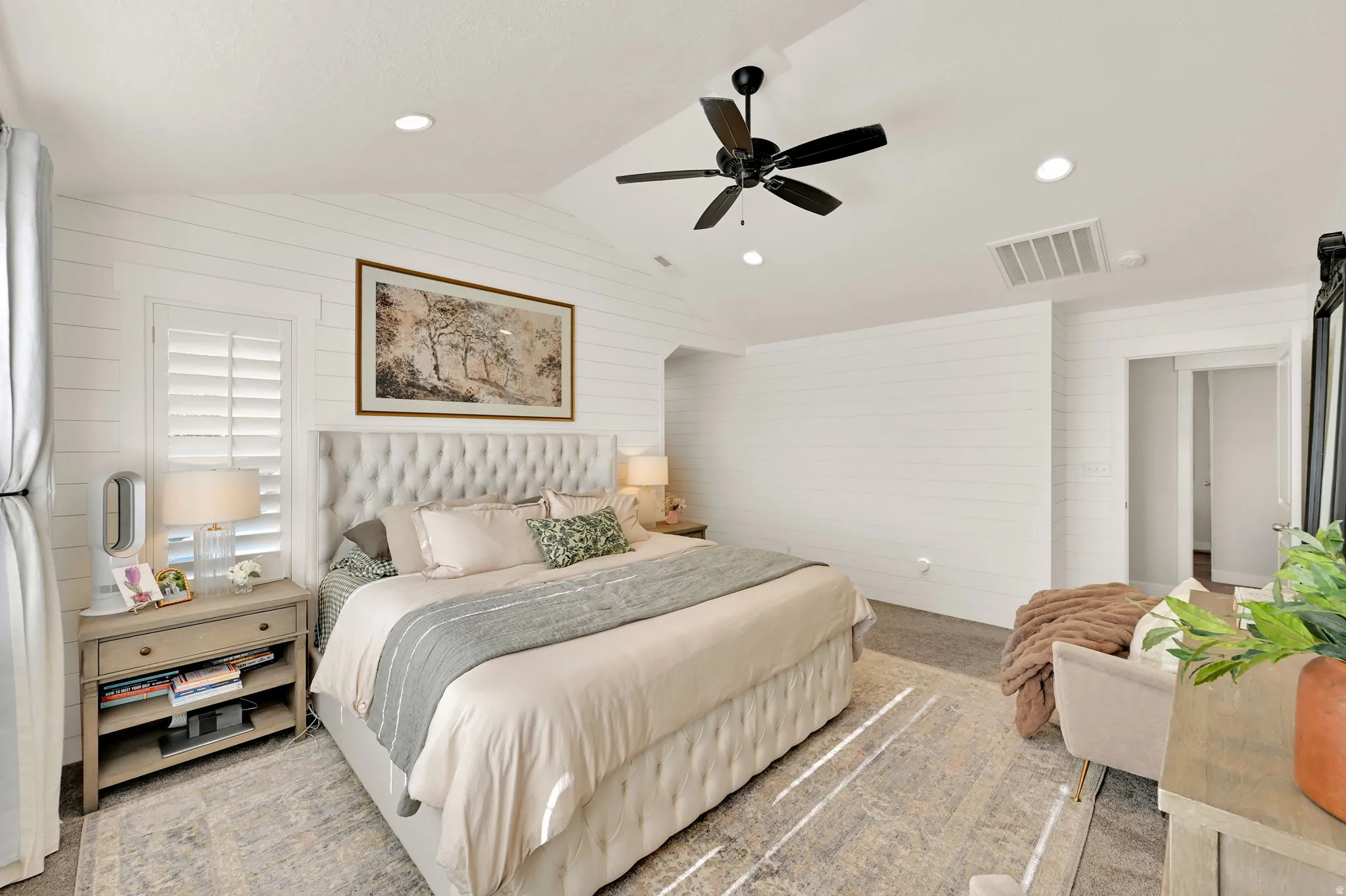 Primary interior space featuring white shiplap walls, recessed lighting, and a ceiling fan