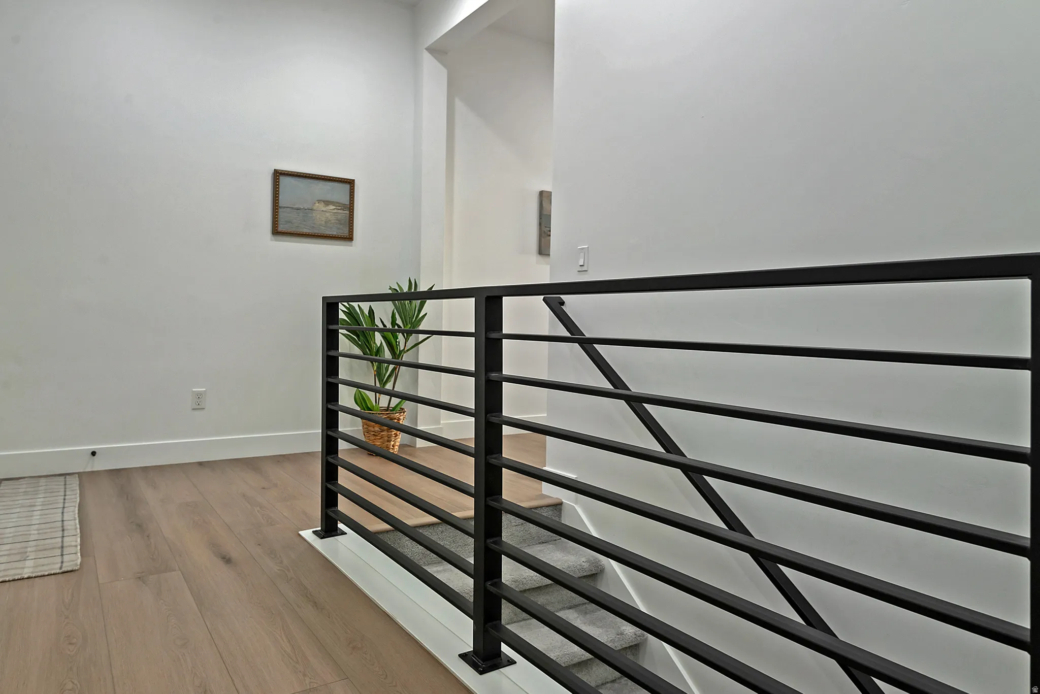 Contemporary black metal horizontal bar railing system