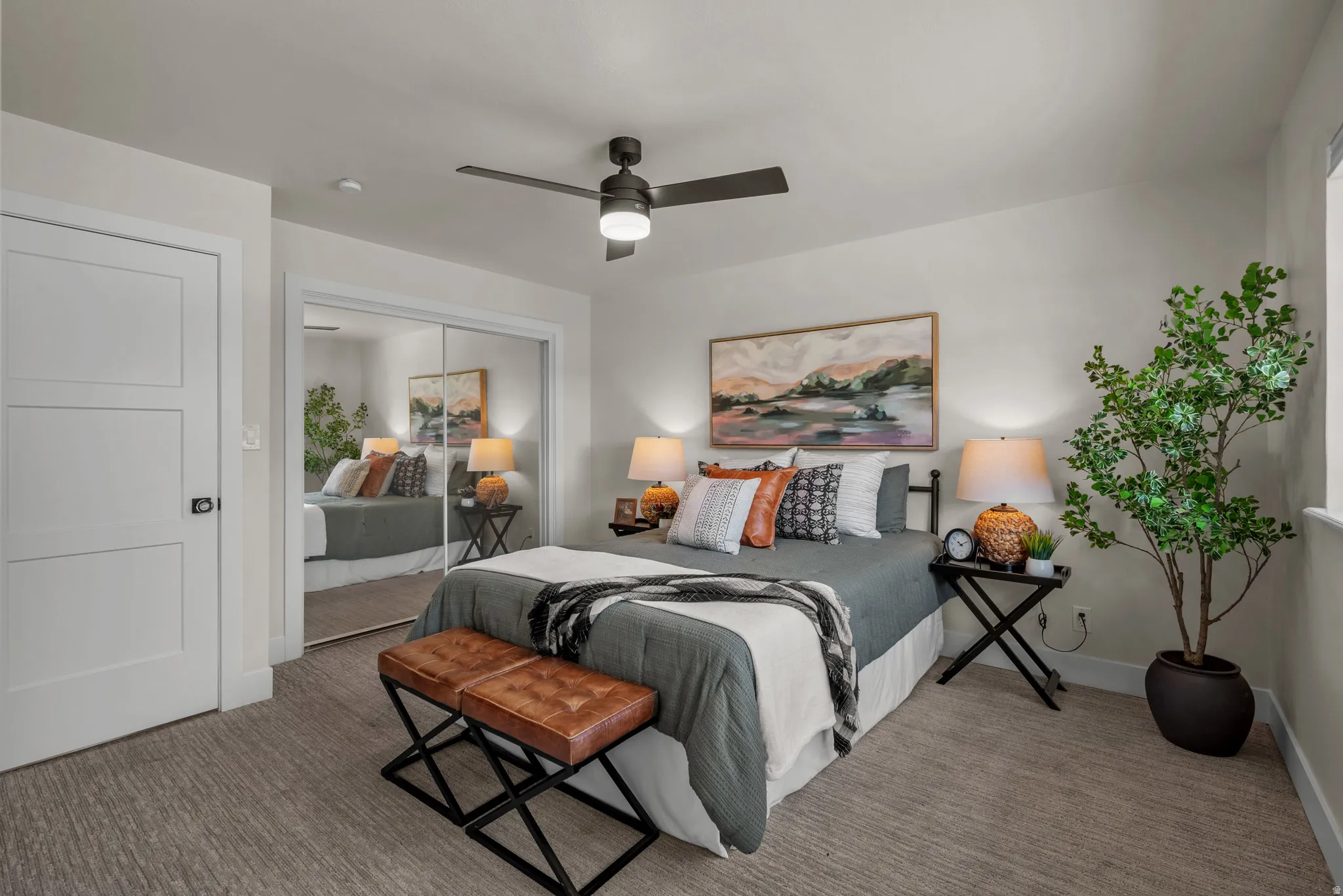 Bedroom featuring neutral wall color, recessed lighting, ceiling fan with integrated light, and wood-finish flooring