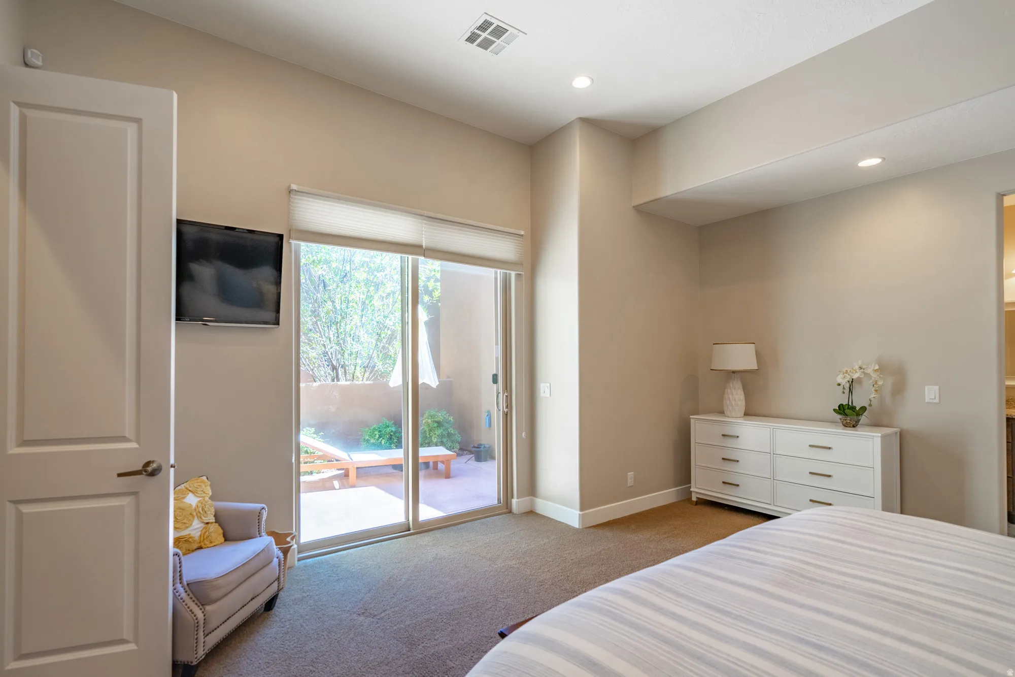 Interior room featuring neutral wall tones and recessed lighting