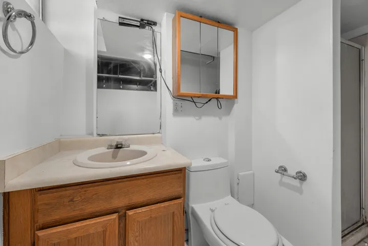 Bathroom vanity with laminate countertop and integrated sink
