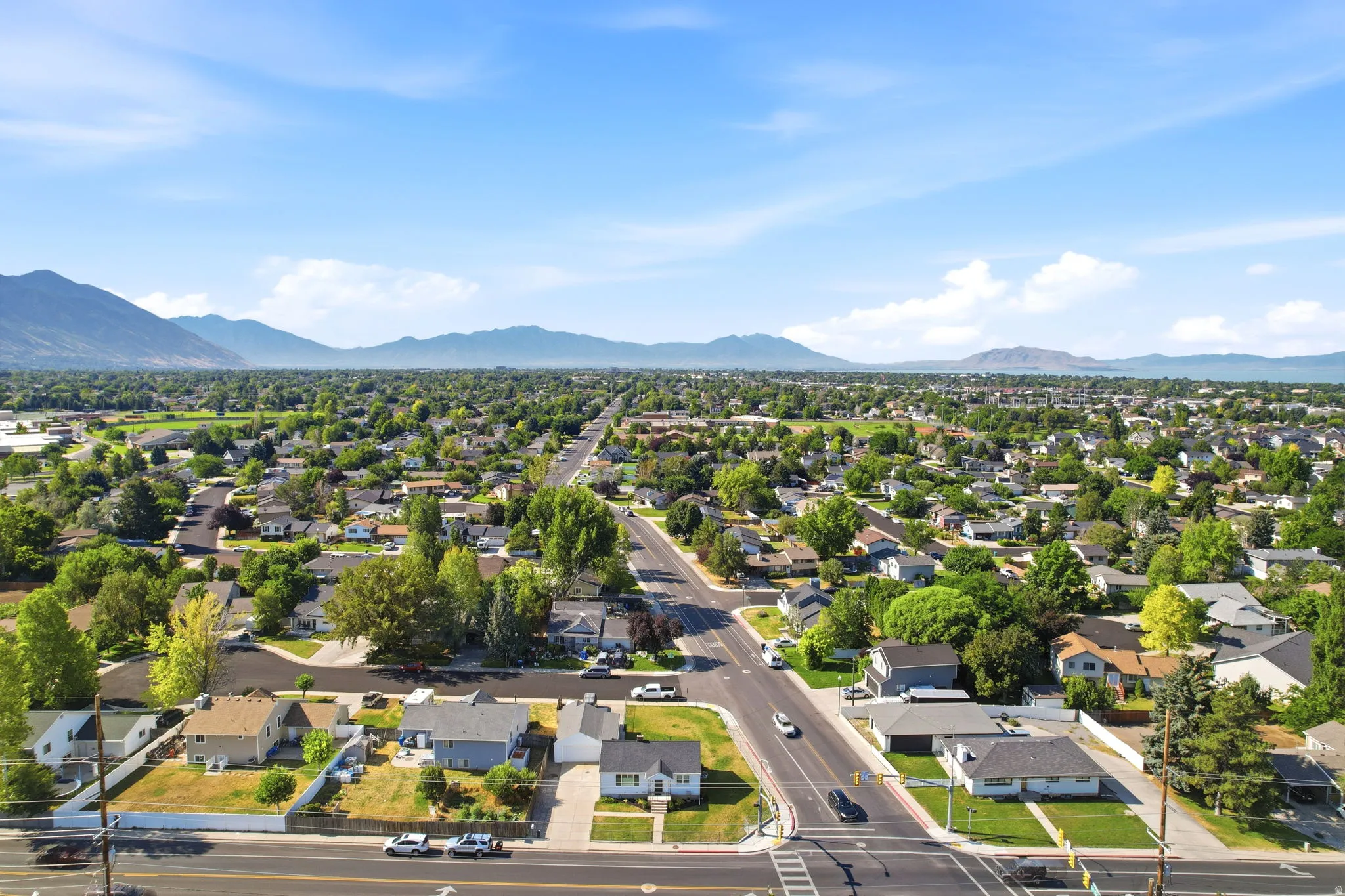 Expansive residential area featuring a grid street pattern and numerous mature trees