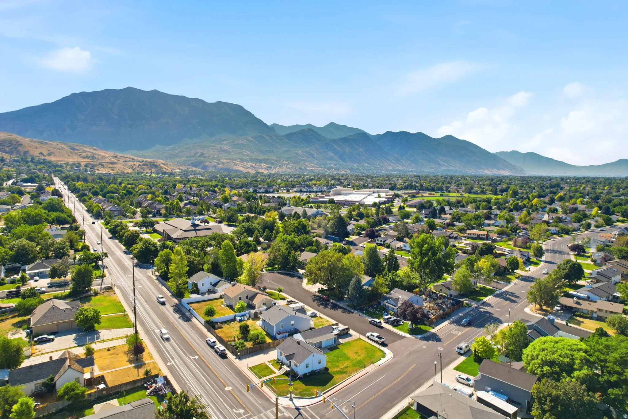 Expansive aerial perspective showcasing a residential area with varied housing styles