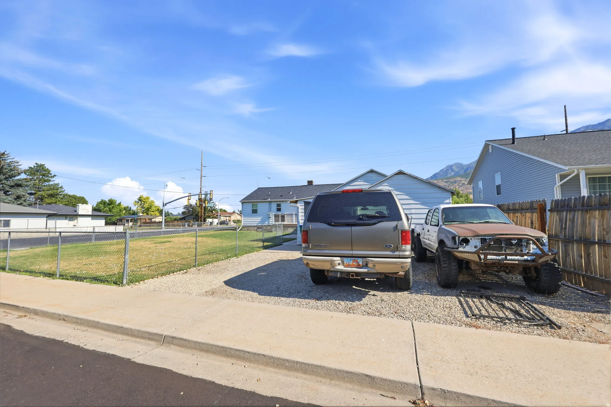 Gravel parking area offering off-street vehicle storage