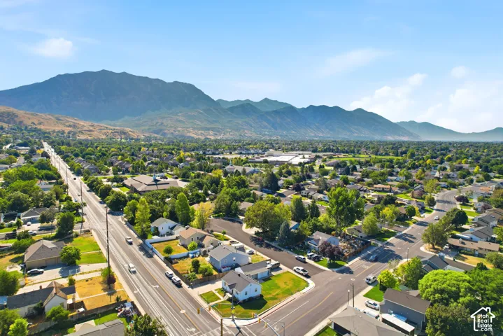 Expansive aerial perspective showcasing a residential area with varied housing styles
