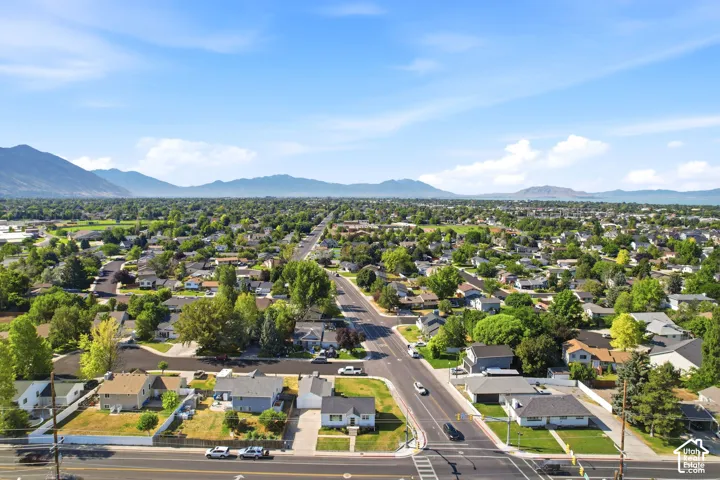 Expansive residential area featuring a grid street pattern and numerous mature trees