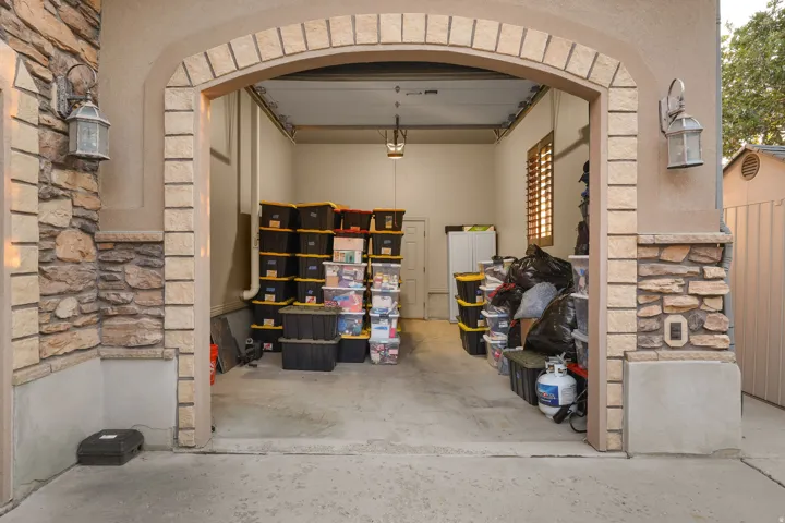 Spacious garage featuring a concrete floor and neutral wall paint