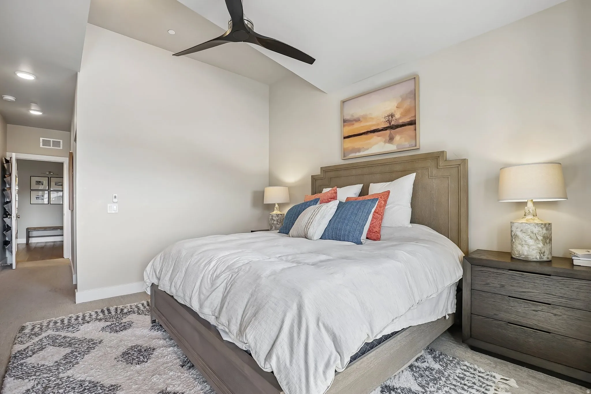Bedroom featuring a vaulted ceiling and a contemporary ceiling fan