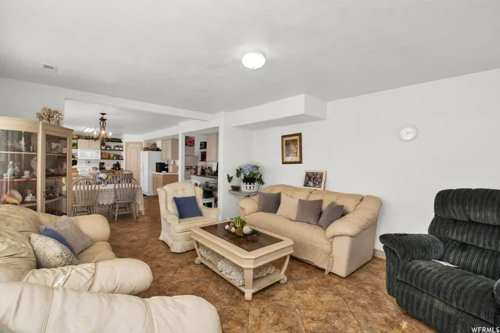 Open concept living area featuring tile flooring