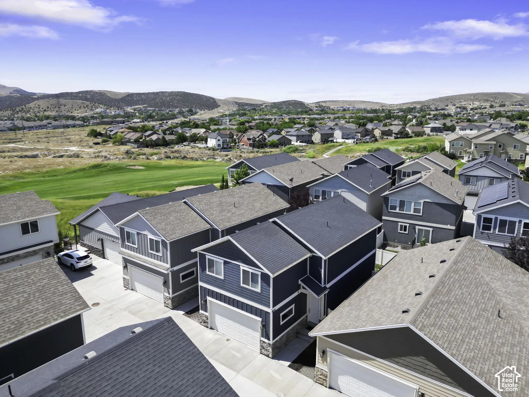 Aerial perspective showcasing a residential community with varied architectural styles