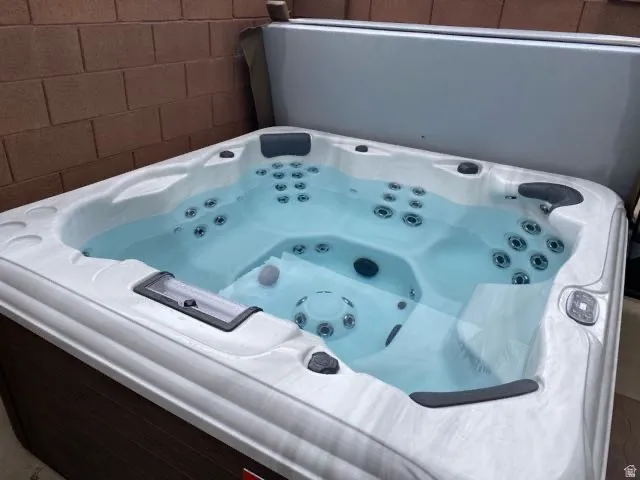 Built-in spa featuring multiple jets, ergonomic seating, and an integrated cover