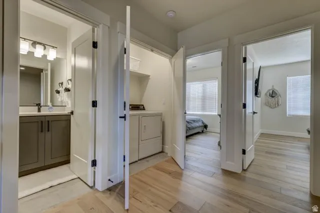 Hallway with wood-finish flooring