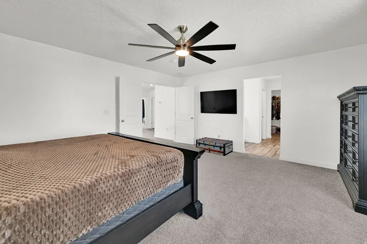 Primary bedroom with a ton of space! Neutral and bright with en-suite attached.