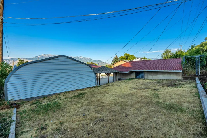Detached metal quonset hut structure