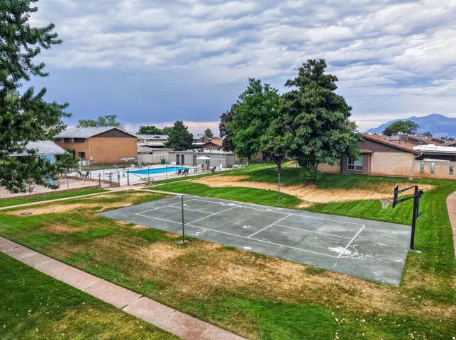 Outdoor basketball court and swimming pool amenity areas