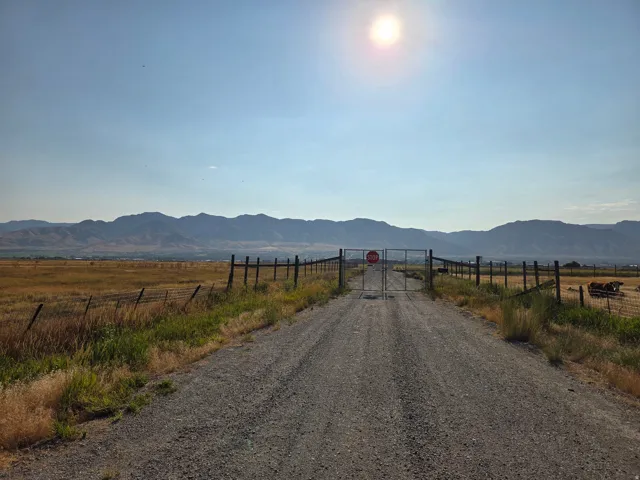 Gravel road entrance to west side of Airport