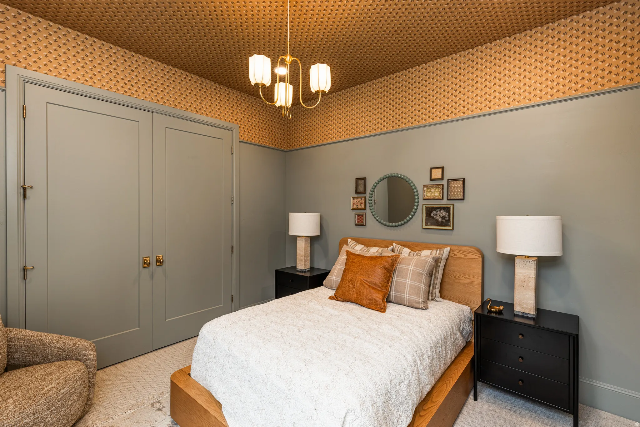 Bedroom featuring a patterned ceiling and light gray walls