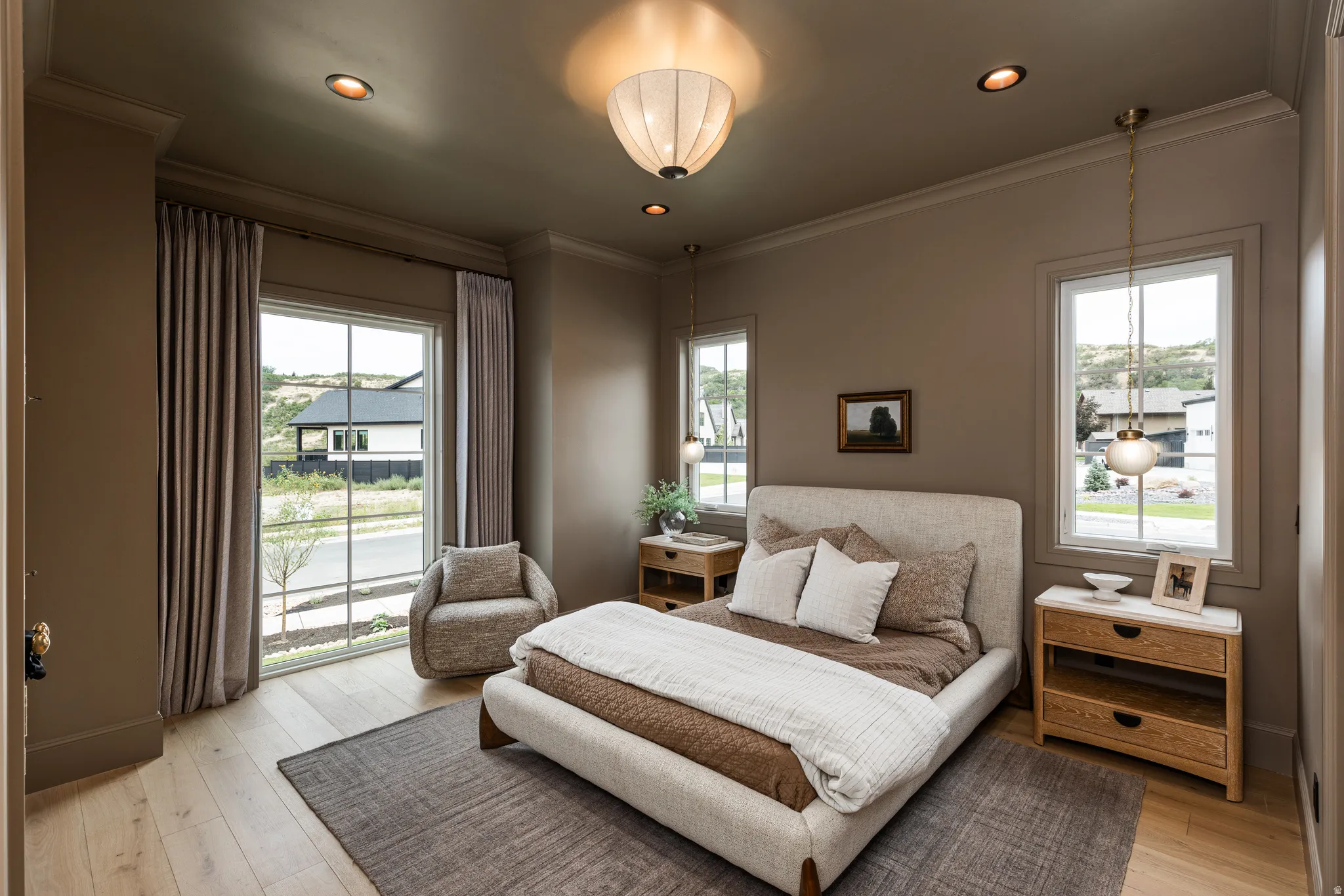 Bedroom featuring wood-finish flooring, recessed lighting, and a contemporary ceiling fixture