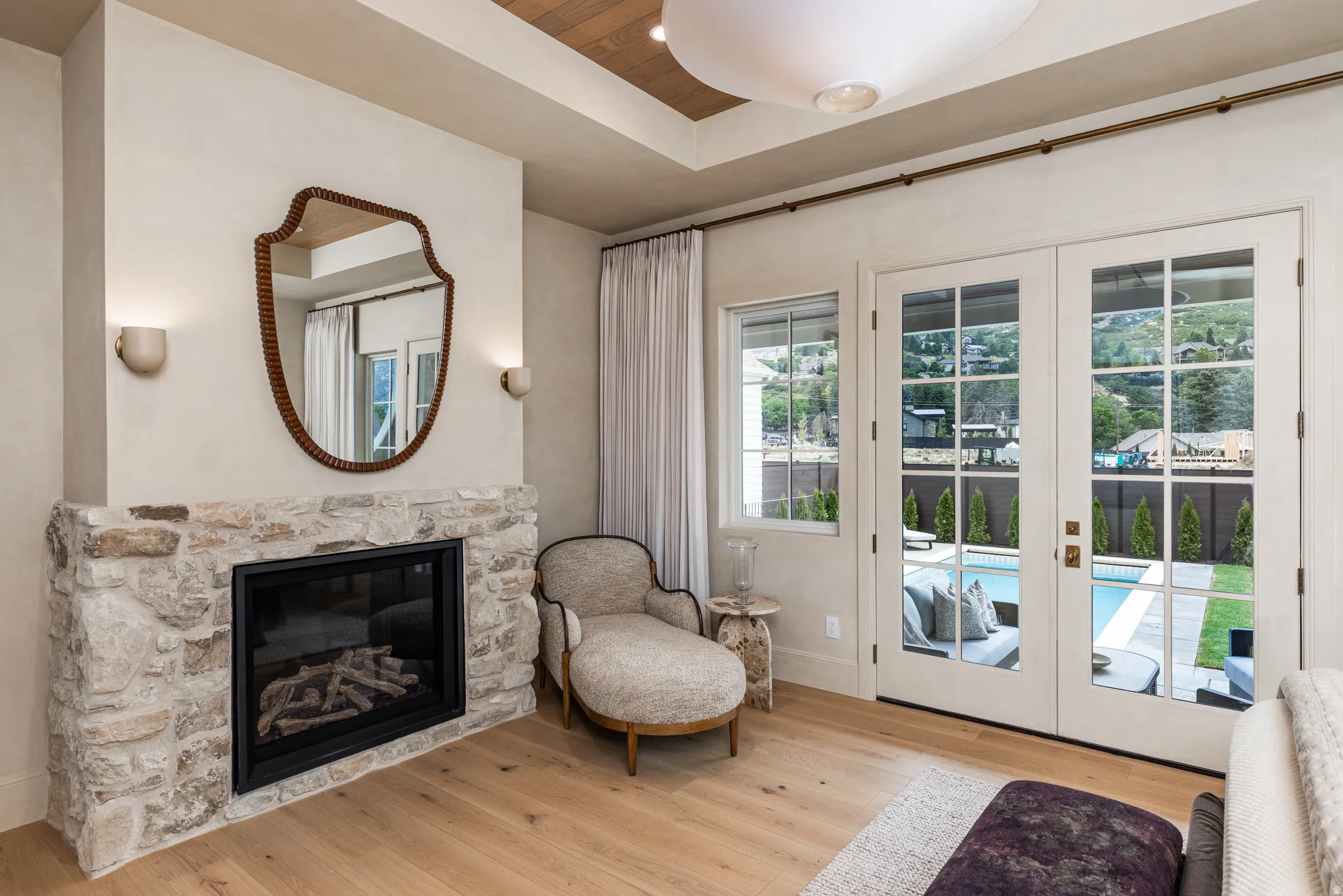 Stone-clad fireplace with a gas insert
