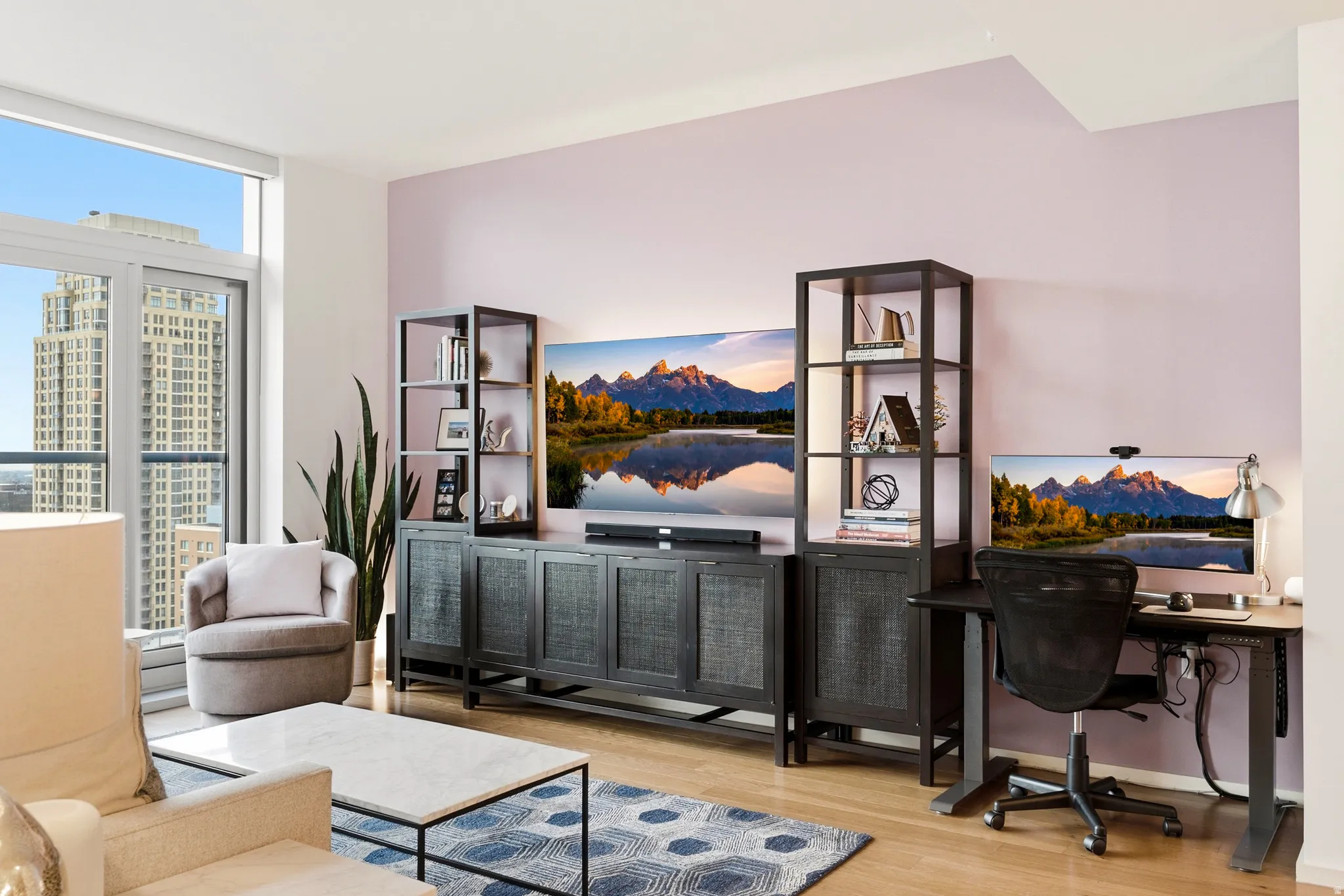 Light wood-finish flooring complements the pale lavender wall