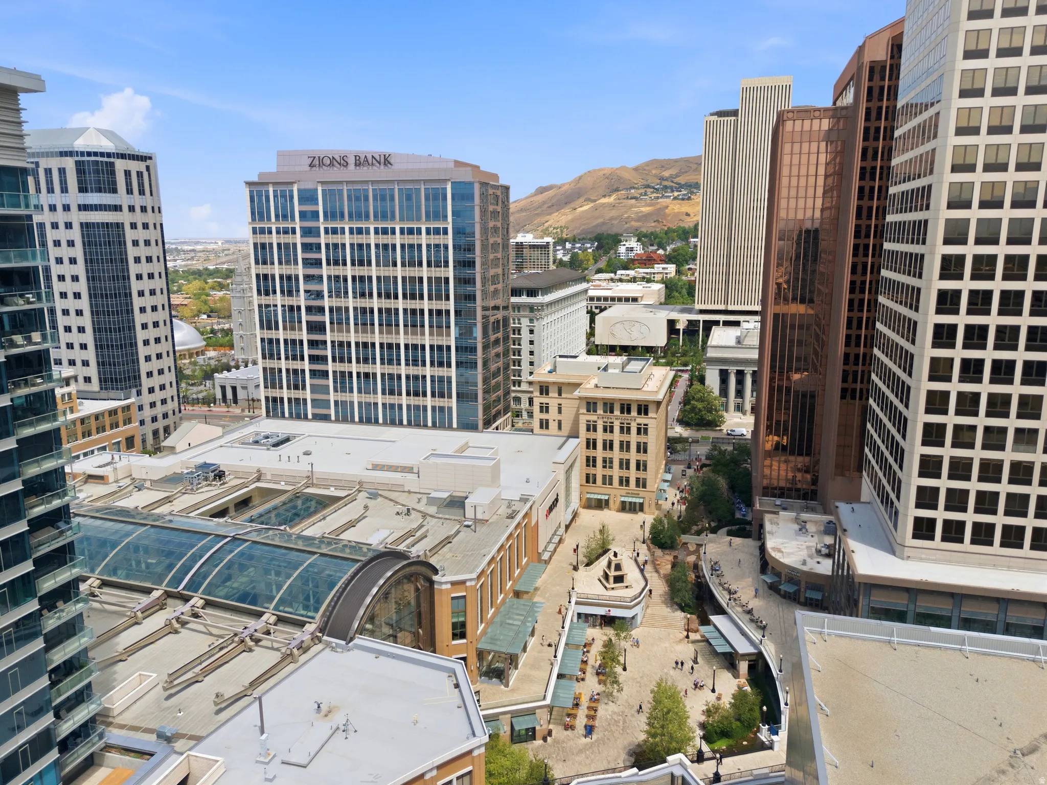 Urban high-rise building with extensive window lines overlooking downtown area
