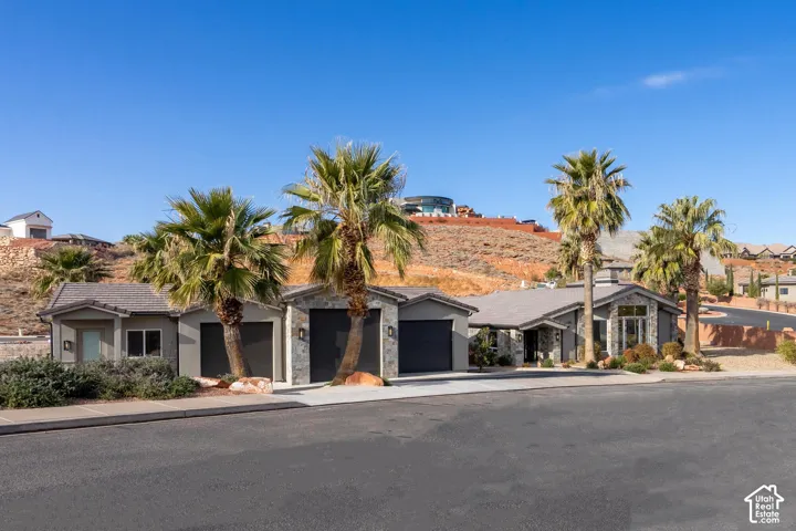 Contemporary desert architecture featuring a combination of stone and stucco finishes