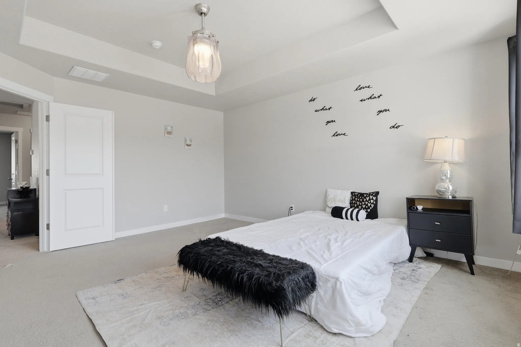 Recessed ceiling featuring a contemporary chandelier