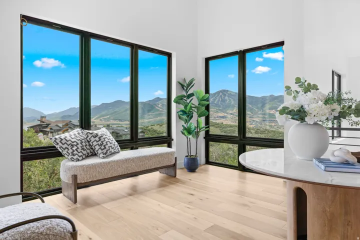 Floor-to-ceiling windows with black framing