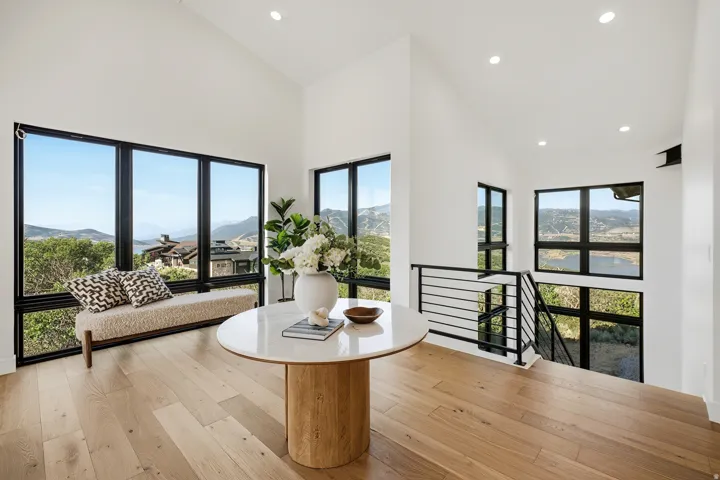 Soaring vaulted ceiling with recessed lighting