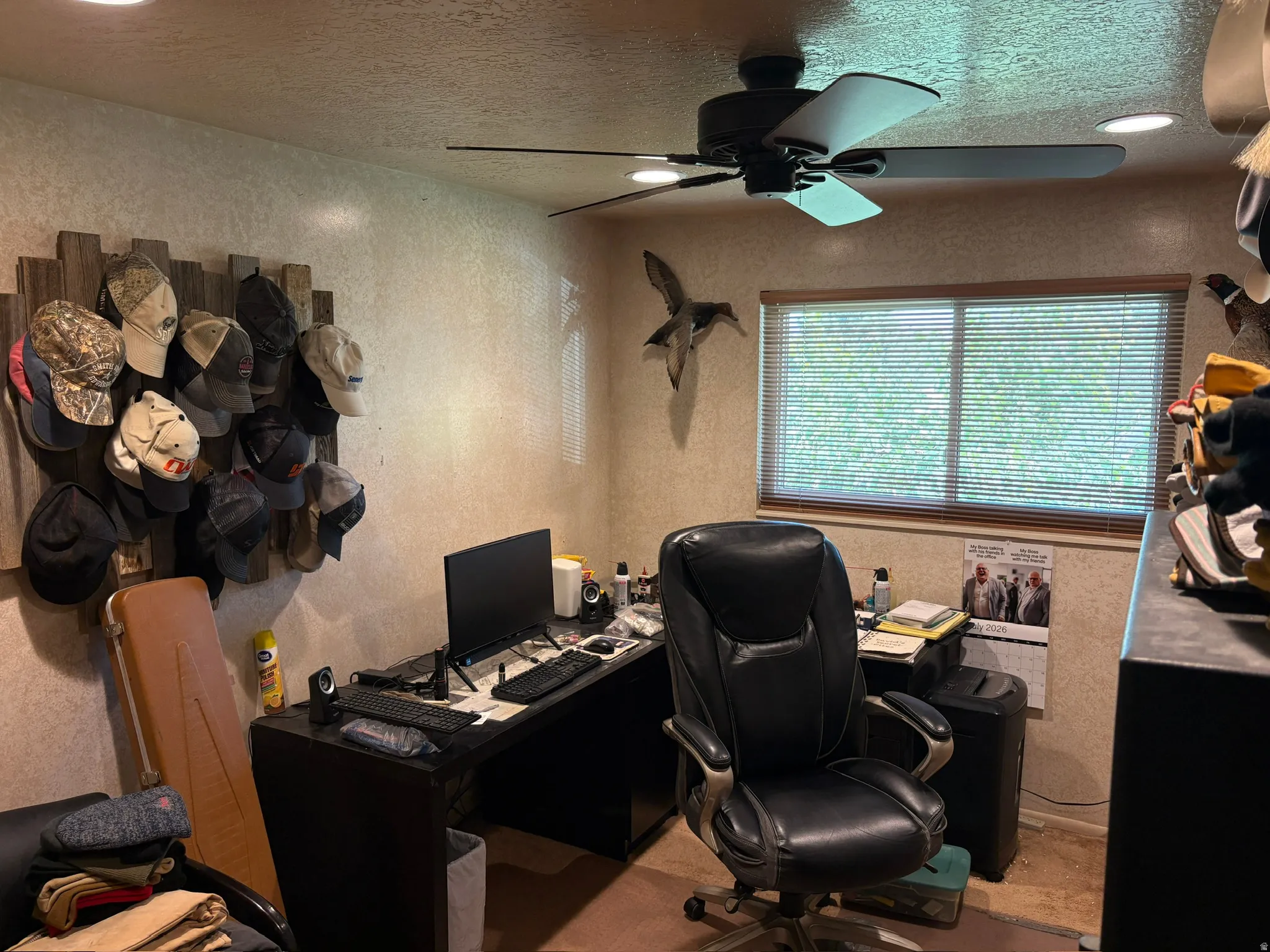 Room featuring a window with blinds, a ceiling fan, and recessed lighting