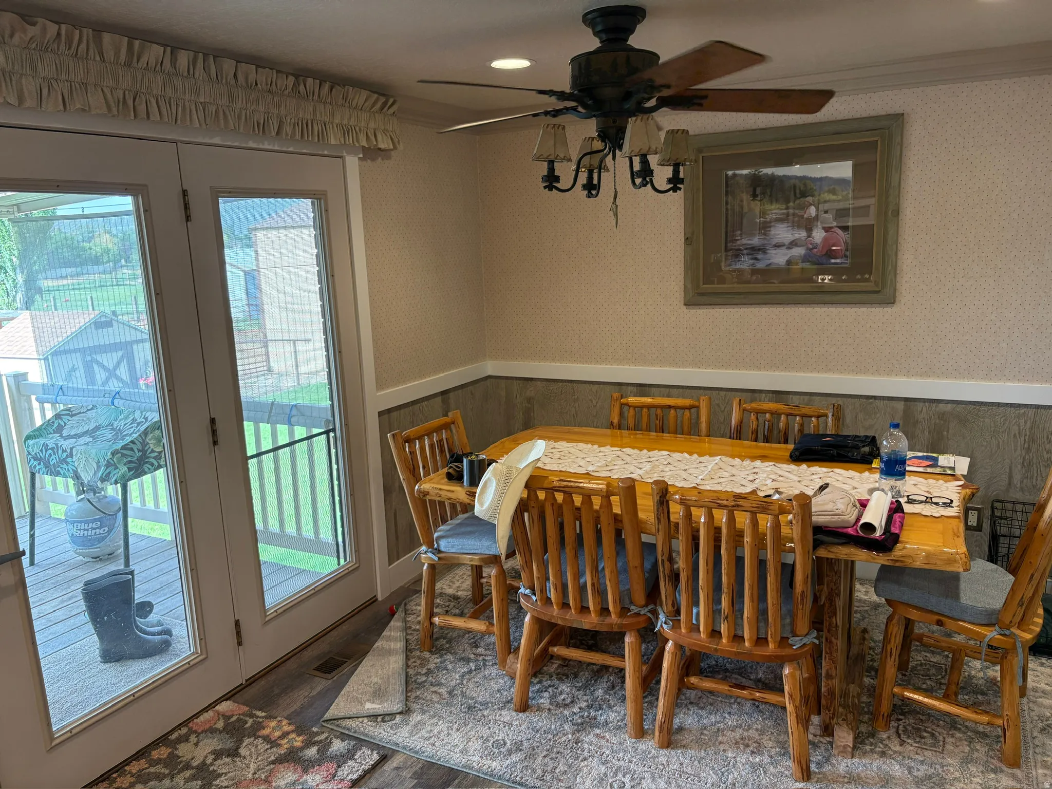 Dining area featuring French doors opening to an outdoor deck