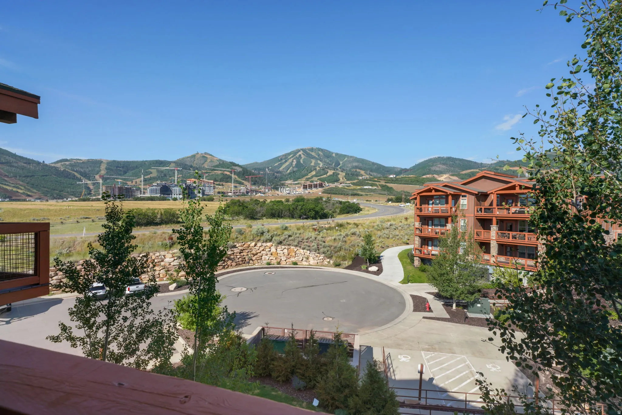 Expansive mountain scenery with distant ski slopes
