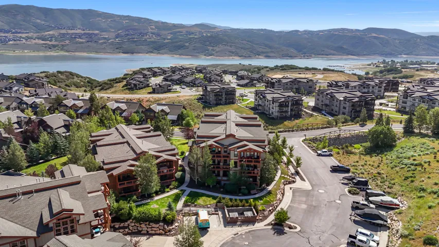 Expansive residential community featuring multi-story buildings, pitched roofs, and exterior balconies