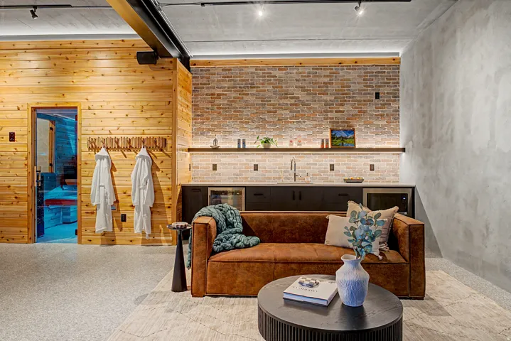 Exposed brick accent wall with under-cabinet lighting