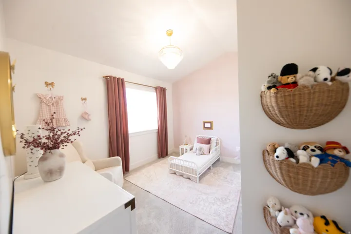 Soft pink walls with high vaulted ceilings
