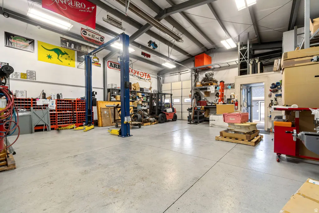 LARGE (approximately 1,200 SF) detached shop with heat, 220v power, oversized door, and rear access to 1300 East.