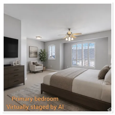 Spacious bedroom featuring light neutral walls and carpeted flooring