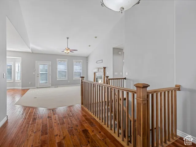 Entrance Hardwood flooring and wood banister detailing