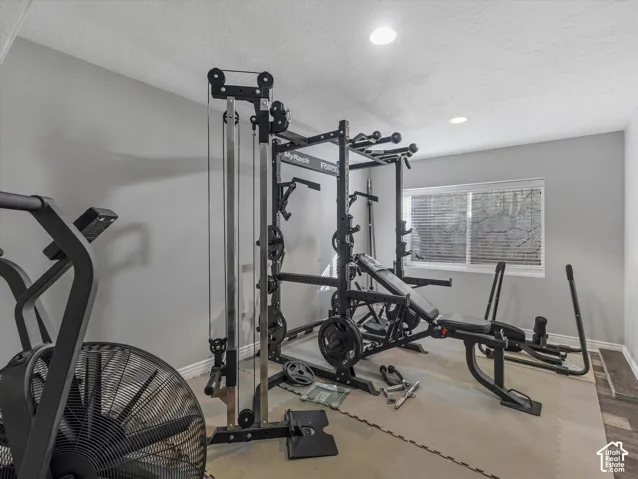 This could be a 5th bedroom but no closet. Great office or flex room.  equipment excluded