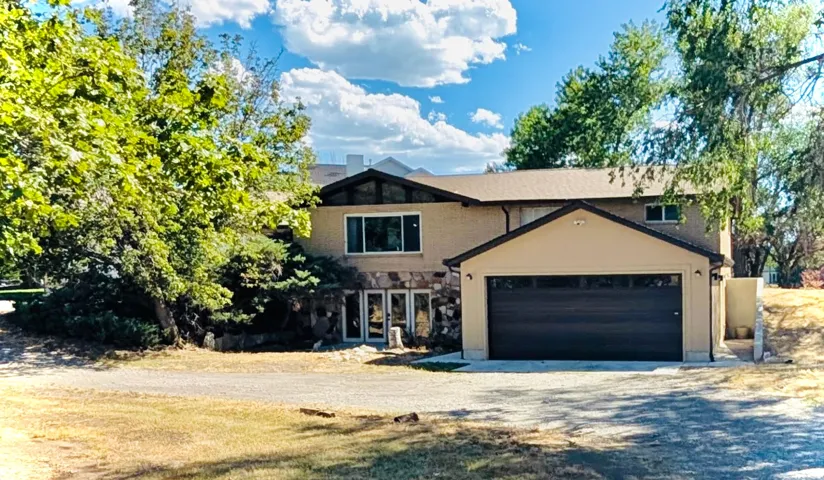MIL - entrance and 2-car garage
